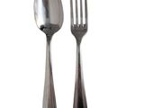 two forks and a spoon sitting next to each other