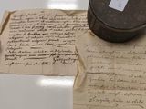 a piece of paper on a table with a piece of writing on it