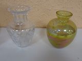 three vases sitting on a table next to each other