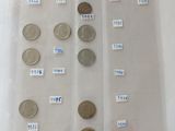 a lot of coins in a plastic bag on the table
