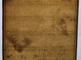 someone holding up a piece of paper with a drawing on it