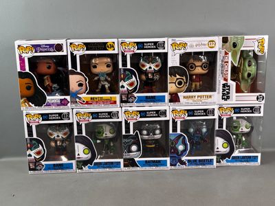a lot of funko pop vinyl figures in the box