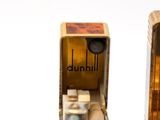a small coffee machine sitting on top of a table
