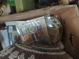 a box full of items that are sitting on the floor