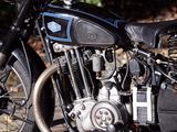 a motorcycle that is parked on the side of the road