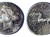 a close up of a coin with a horse on it