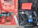 two tools in a case that are sitting on the floor