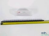 a ruler that is next to a ruler on a table