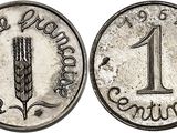 a close up of a one cent coin on a white background
