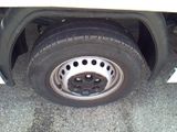a close up of a tire on the side of a truck