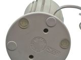 a close up of a white light on a white background