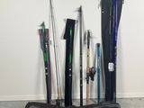 a lot of fishing rods and poles on the floor