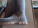 a shoe that is sitting on top of a box