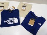 the north face t - shirts are on display at the store