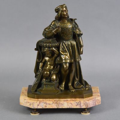 une image représentant une statue en bronze d'un homme avec un chien