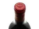 a bottle of wine that is sitting on a table