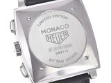 a close up of a watch on a white background