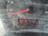 a close up of a speedometer on a car ' s dashboard