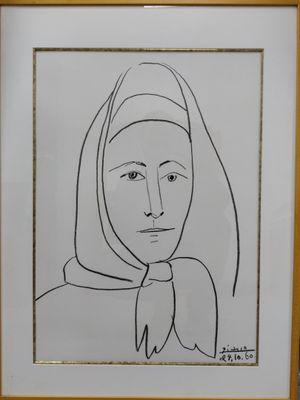 an ink drawing of a woman with a scarf on her head