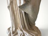 marble statue of a woman with a veil on her head