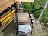 an image of a chair and a table in a yard