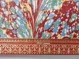 a picture of a red and blue painting on a wall