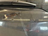 a sticker on the hood of a car that says apache