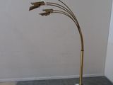 a lamp that is on a stand in a room