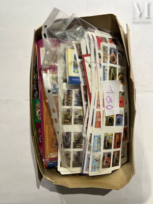 a cardboard box full of postcards on the wall
