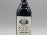 la bouteille de vin rouge est posée sur la table