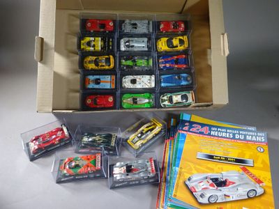 a box of assorted toy cars on a table