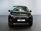 a black car that is parked in a showroom