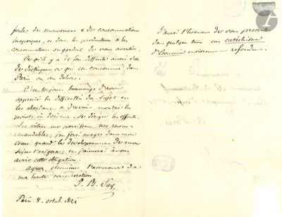 un vieux document écrit posé sur une table