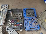 many tools that are laying out on the floor