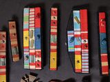 a lot of different types of dog collars on the table