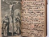 a book with a picture of jesus on the cross on it