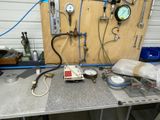 a picture of a workbench with a lot of tools on it