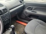a car dashboard with a steering wheel and a dash board