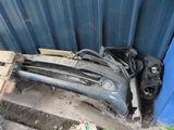 an image of a car bumper that is sitting on a pallet