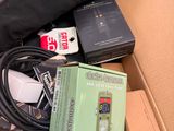 a box full of electronic equipment sitting on top of a table