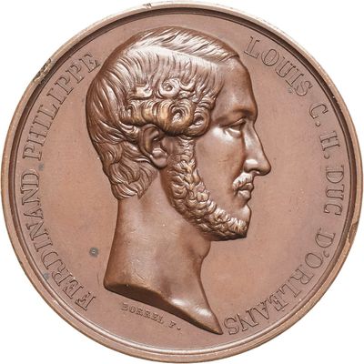an image of a bronze medal with a man ' s face on it