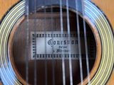 a close up of a guitar with a label on it