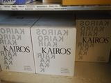 several boxes are stacked on top of each other on a shelf