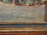 a painting on the wall of a room with a painting on the wall