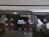 a close up of a machine with a digital clock on it