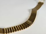 bracelet made of brass bars and a gold buckle