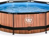 a large wooden swimming pool with a metal frame around it