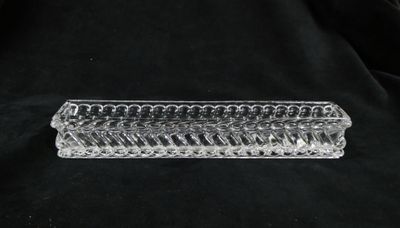 an image of a clear glass container on a black background