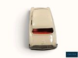 a toy car that is sitting on a white surface
