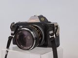 a camera that is sitting on top of a clear box